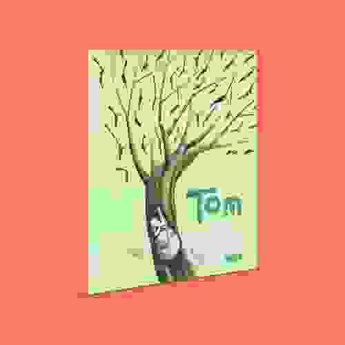 Capa Tom